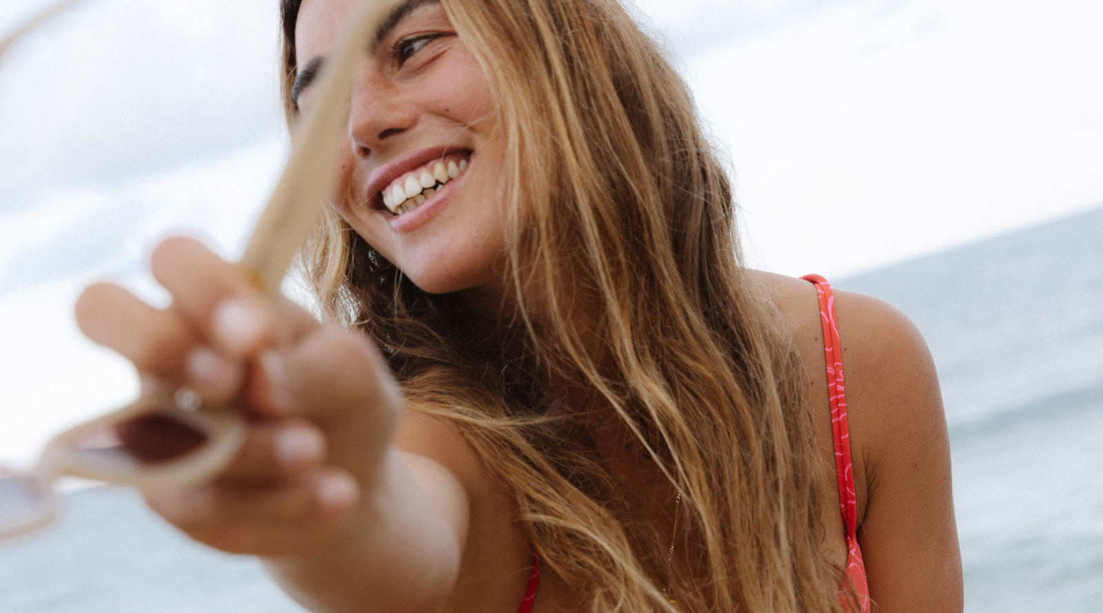 Woman sitting at the beach