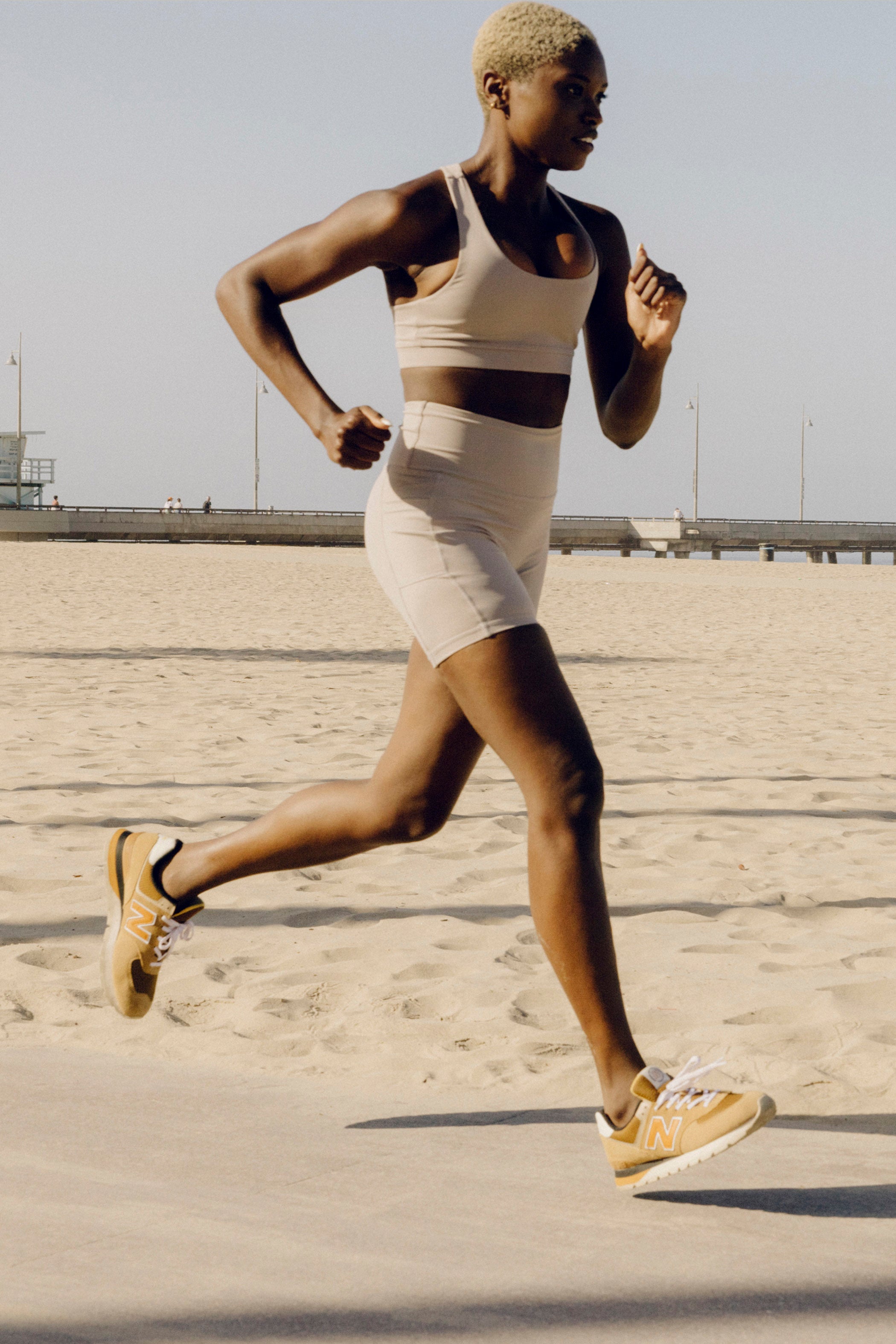 woman running on the beach