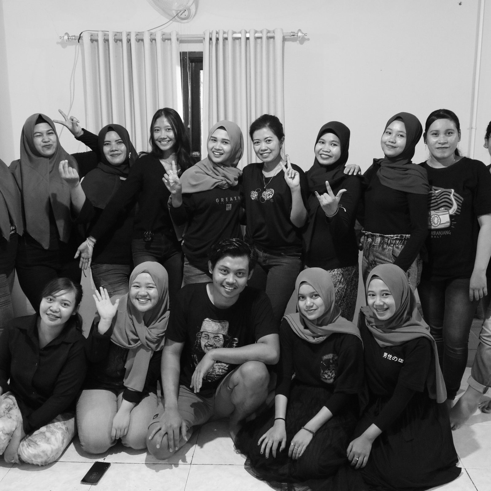 Black and white photo of female swimwear factory workers in Bali  