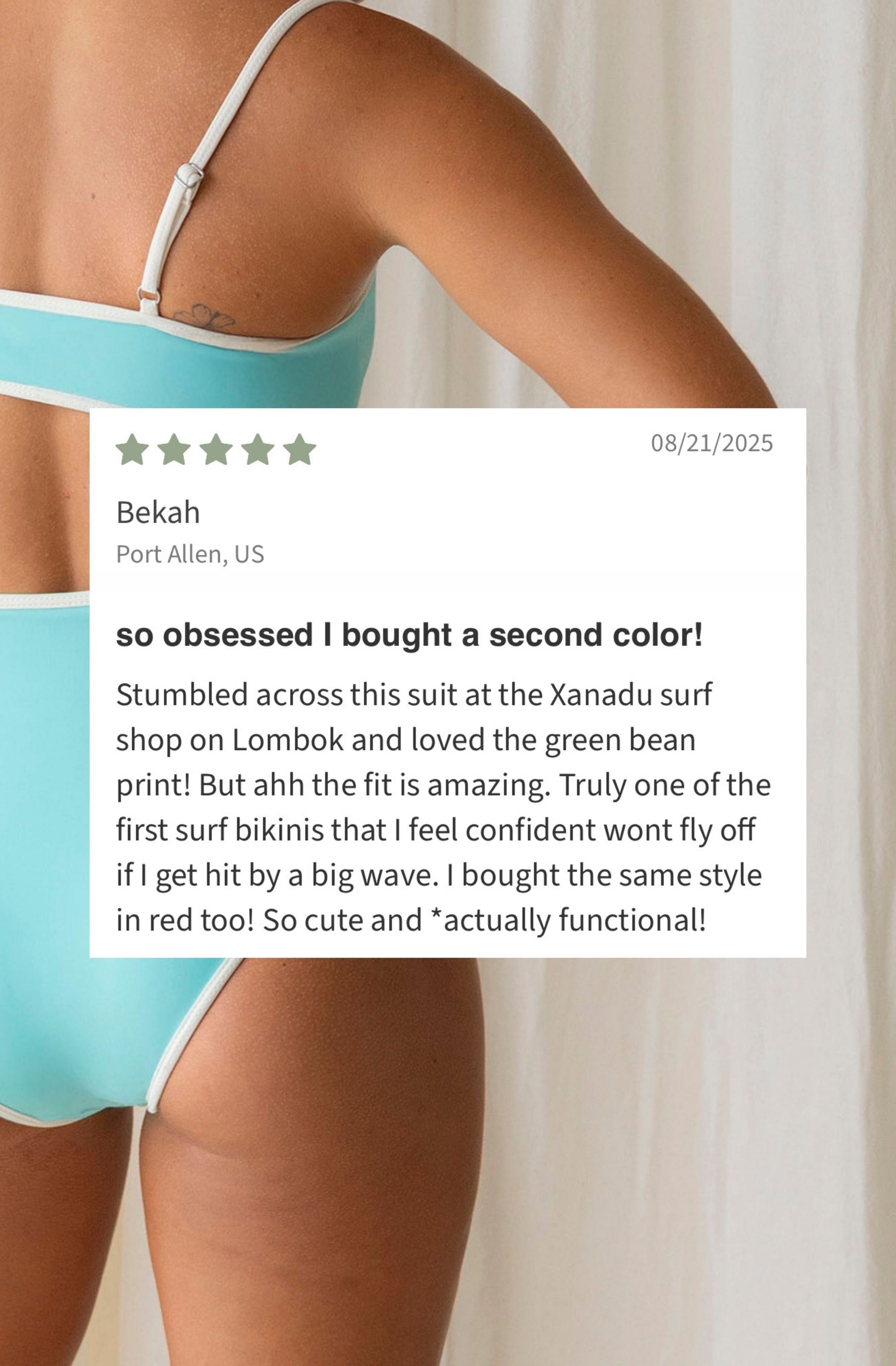 Person wearing a blue bikini with a review overlay on a white background