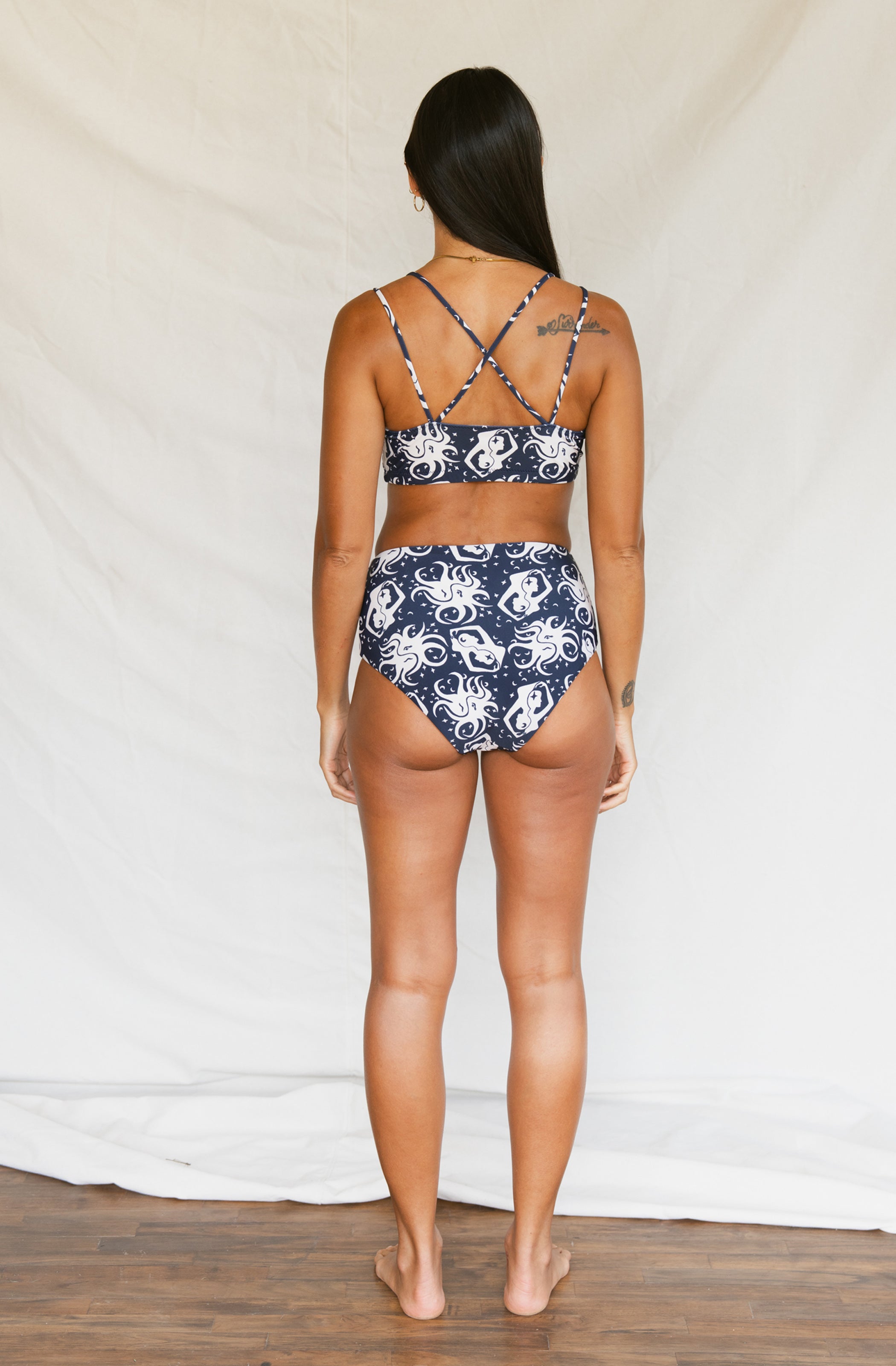 Woman wearing printed blue bikini 