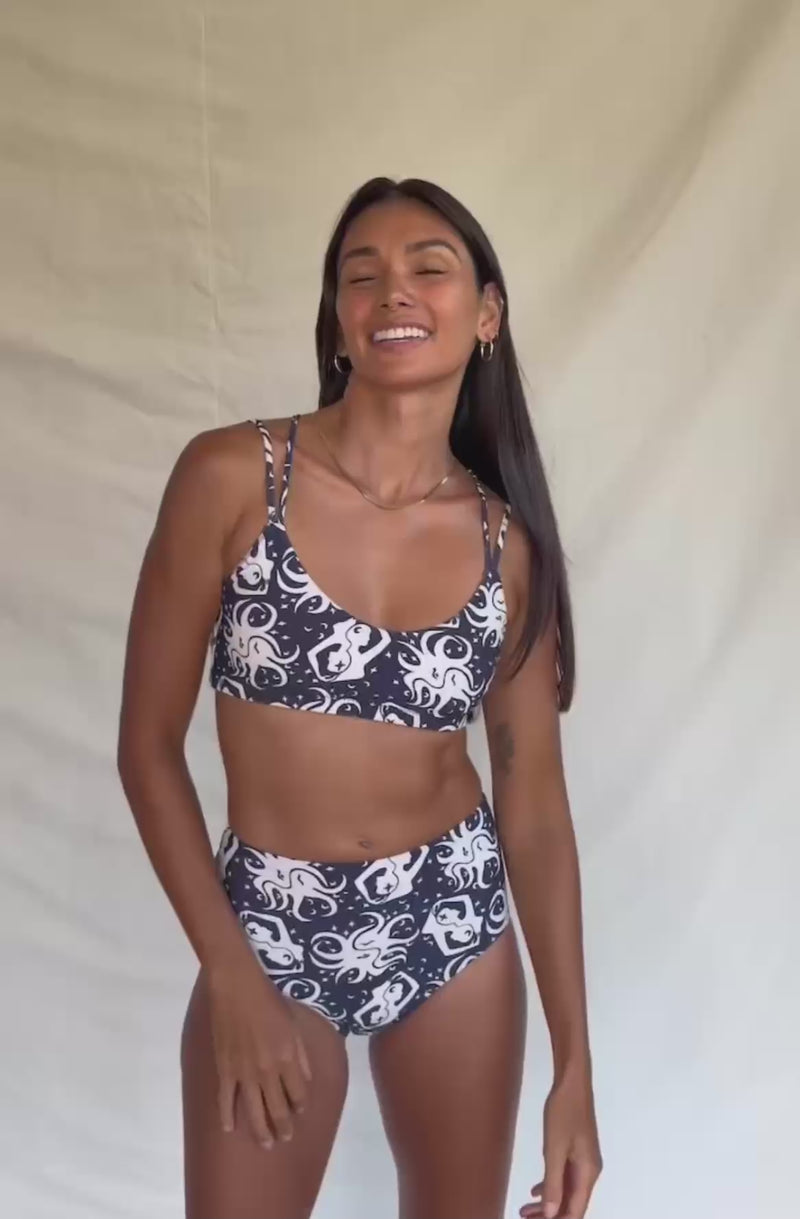 Women wearing blue and white bikini