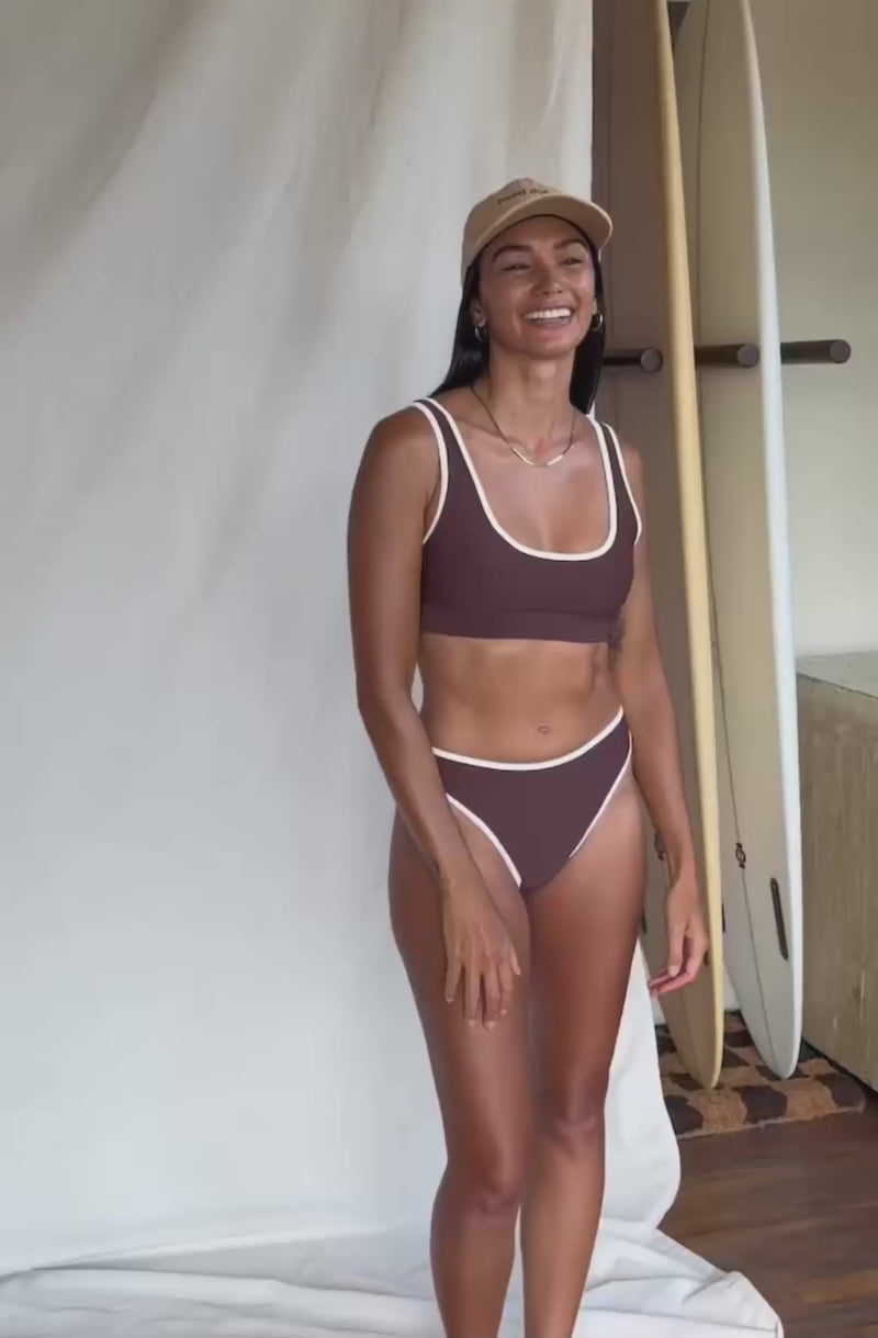 woman wearing brown bikini top and bottom