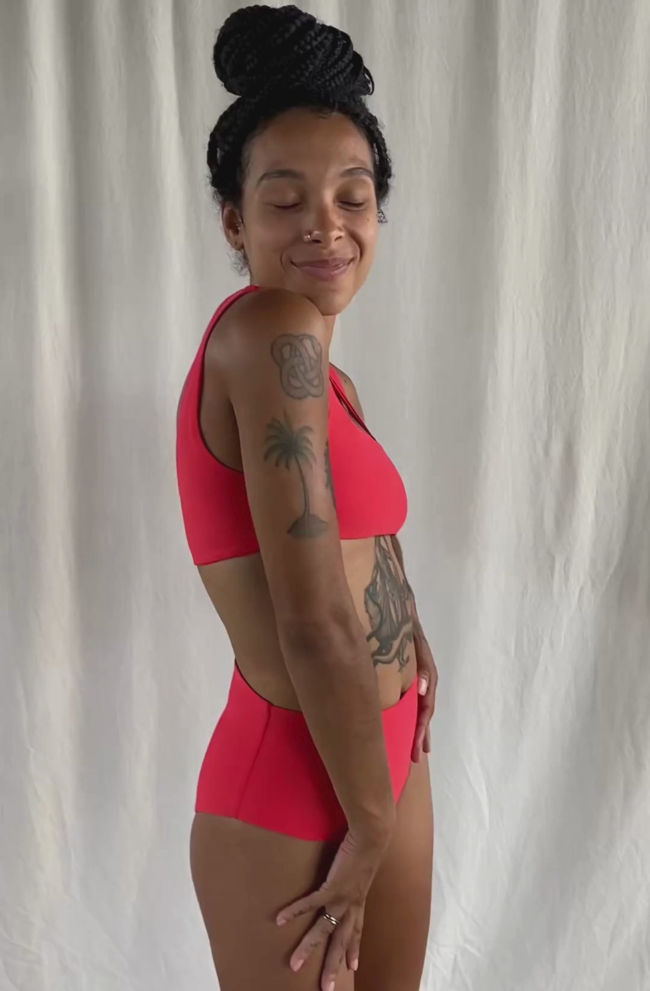 Load video: red ikini woman