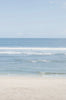    Woman standing in front of ocean wearing Surf_Bikini_Top_Jane_Army