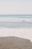    Woman standing in front of ocean wearing Surf_Bikini_Top_Jane_Army