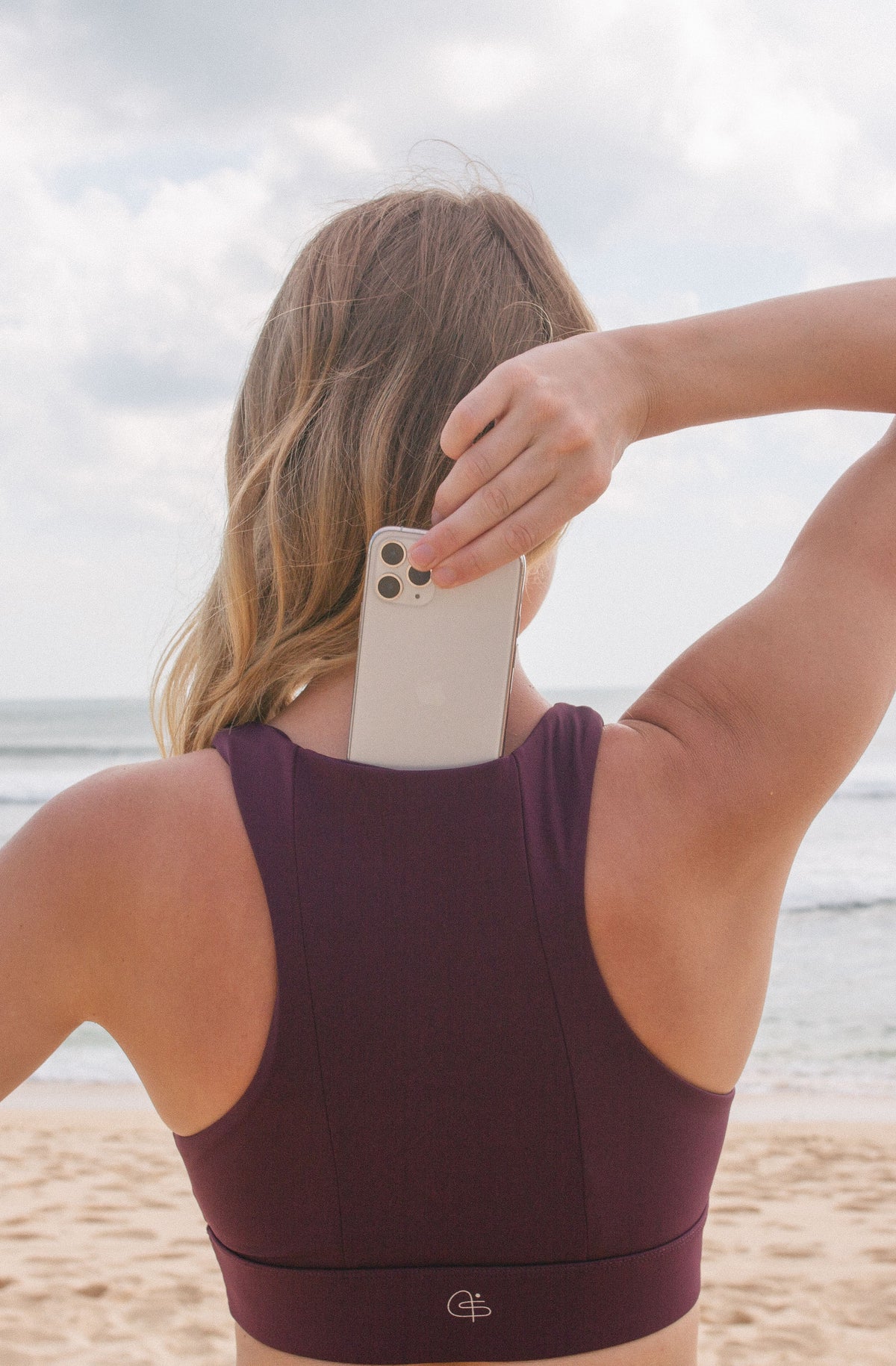 Close up of Isa sports bra cell phone pocket 