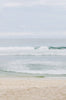    Woman standing in front of ocean wearing Surf_Bikini_Top_Eden_Lavender